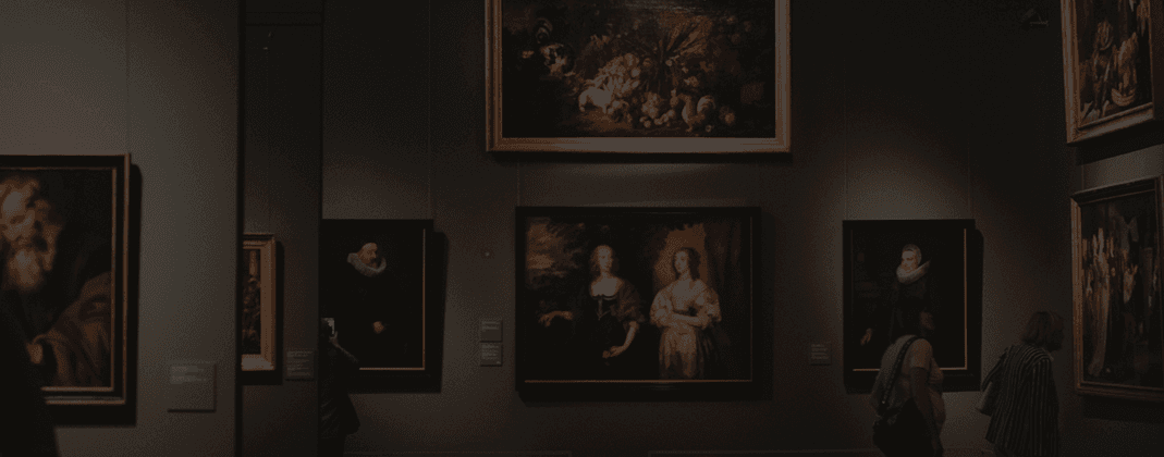 Museum gallery interior with framed paintings